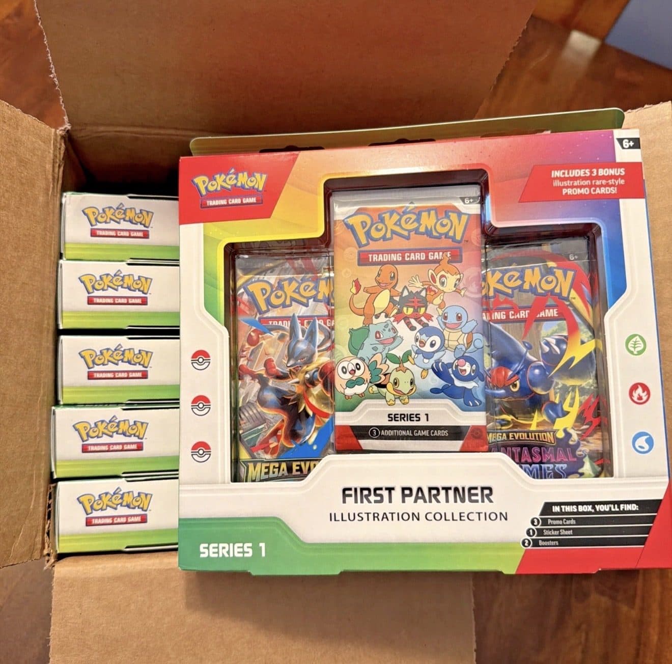 Sealed Pokemon boxes packed in a shipping carton, from KWE2x inventory